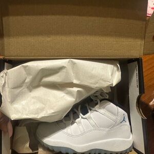 Jordan White Low-Top Sneakers with Light Blue Jumpman